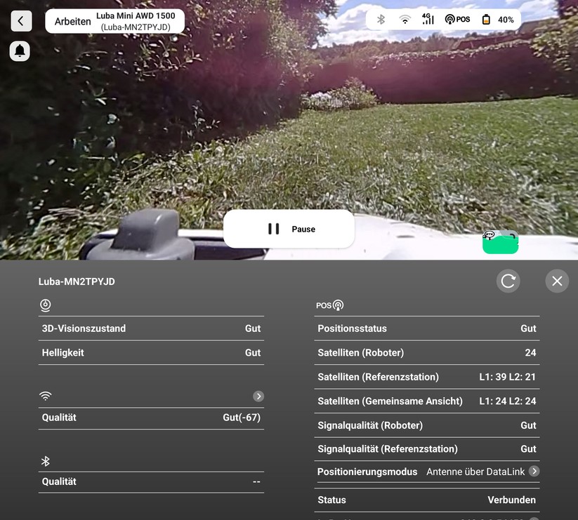Der Luba Mini AWD bietet eine integrierte Kamera, mit der man den Mähvorgang beobachten kann. Ein Klick auf das POS-Symbol zeigt den Status der Navigation und Verbindungseinstellungen.